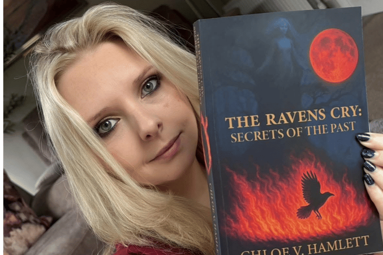 Chloe V Hamlett with her book The Raven's Cry, October 12th 2025.
