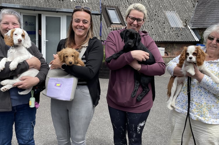 Dogs for Autism volunteer puppy raisers.