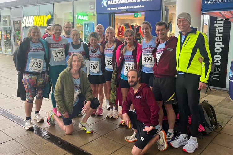 Farnham Runners keeping dry before the Victory five-mile race