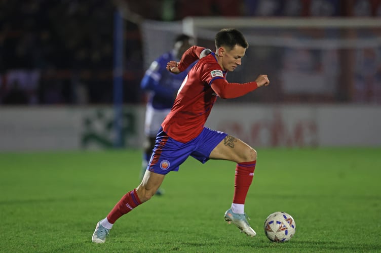 Aldershot Town captain Ryan Hill drives forward during his side's 4-1 win against Wealdstone (Photo: Ian Morsman)