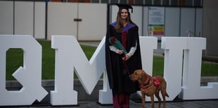WATCH: Medical alert dog helps woman achieve law career dream