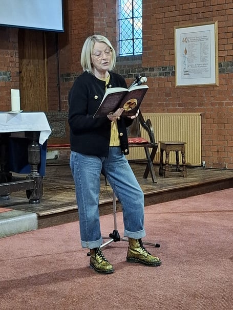 Poet Coral Rumble reads at the 2025 Poetry Competition Awards Ceremony. (Stella Wiseman)