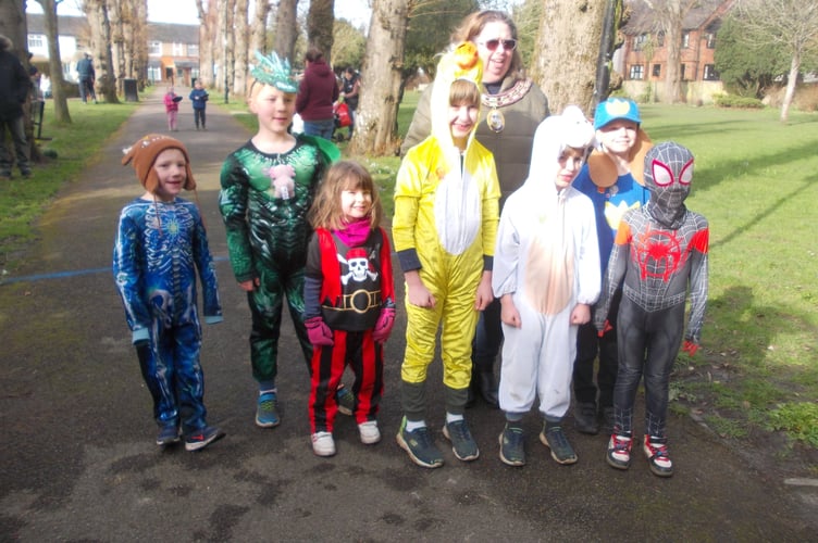 The fancy dress entrants in the Alton Town Council Pancake Race have their picture taken with town mayor Cllr Annette Eyre, Public Gardens, Alton, February 17th 2026.