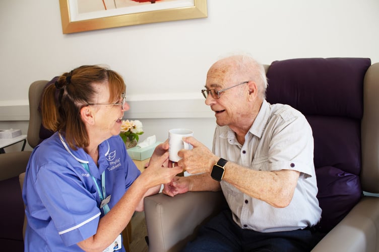 Patient with nurse at Phyllis Tuckwell