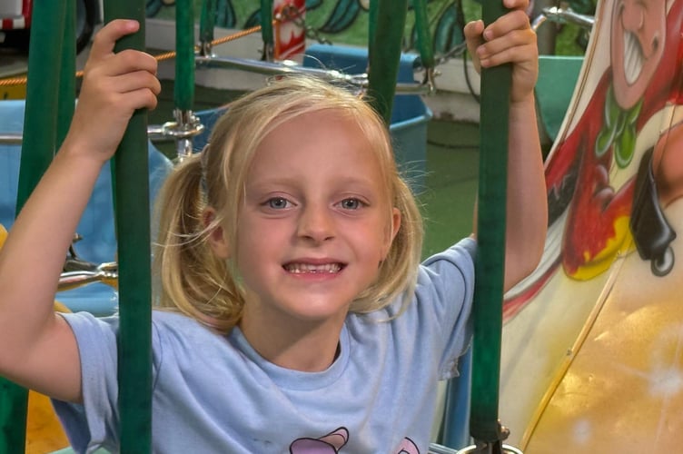 Theia Devine, seven, from Portsmouth died in a crash on the A3 near Hindhead.