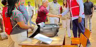 Volunteer meets Mozambique president during flood relief mission