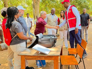 Volunteer meets Mozambique president during flood relief mission