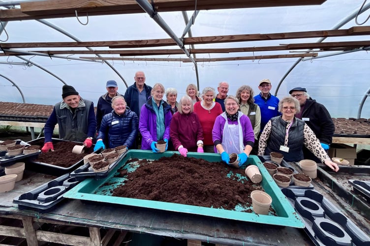 Volunteers helping prepare more than 9,000 pots for Farnham in Bloom.