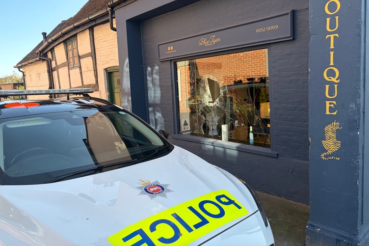 Police outside Blue Tiger Boutique which had its window smashed into in the early hours of Wednesday, March 18