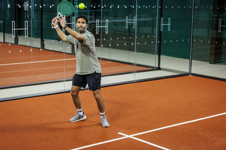 Man playing Padel at Hurlands