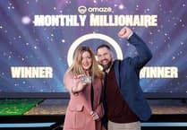 WATCH: Hampshire woman swigs champagne in car park after £1m Omaze win