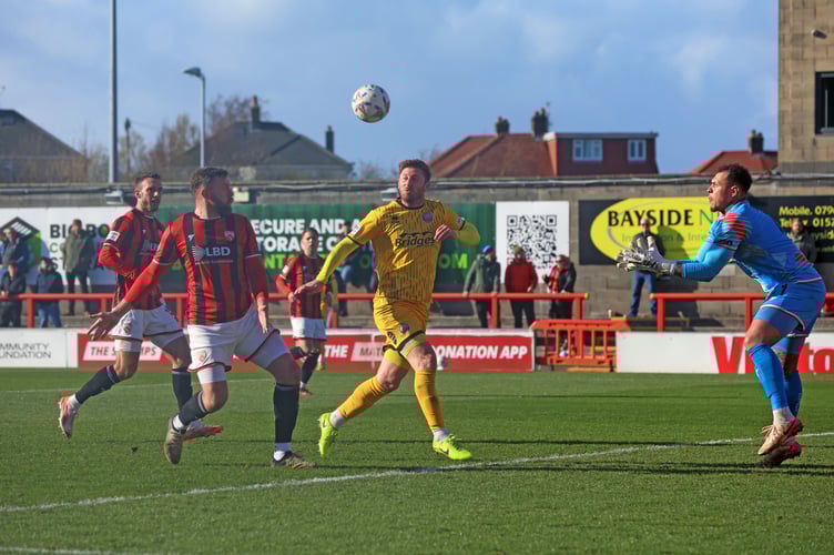 Aldershot Town's James Henry looks for an opening against Morecambe (Photo: Ian Morsman)