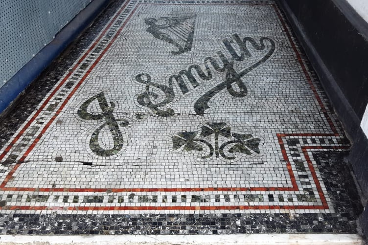 Mosaic outside J. Smyths whose new owners are set to begin work soon