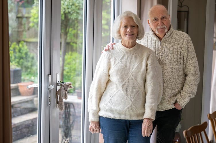Residents Jim and Nicola Andy, Guildford, Surrey, 30th March 2026 // A mysterious peacock has become a neighbourhood pet for this village, as locals say they have no idea where he came from. A suburb of Guildford in Surrey started being visited by a peacock in October last year, and they decided to give him some food and name him Pete. Six months later, the colourful bird has become a local celebrity, living in the gardens of the homes on Beechcroft Drive and tapping on peopleâs back doors for food. Jim Andy, 79, says he was the one to discover and name Pete, after giving him some old ice cream wafers.