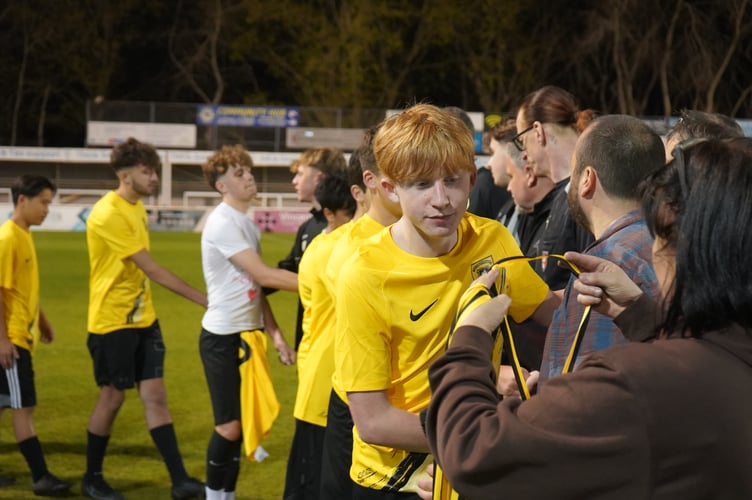 Mytchett Atheltic receiving their medals