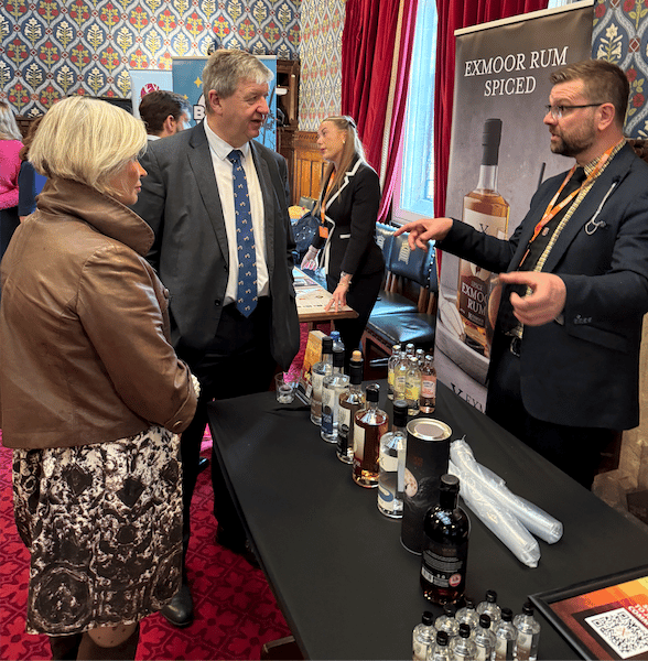 MP and select committee chairman Alistair Carmichael chats wit Ben Strong, from Dulverton's Exmoor Distillery.