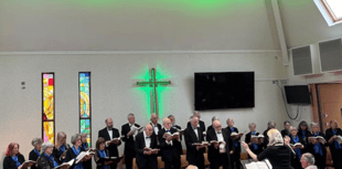 Choral society concert raises more than £850 for hospices