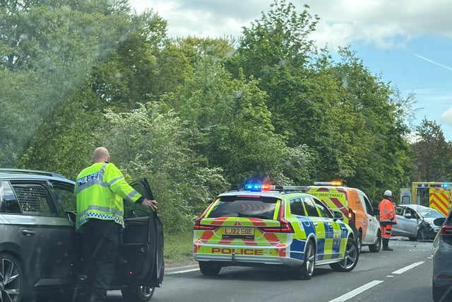 Delays on A31 Hogs Back after car and motorcycle collision