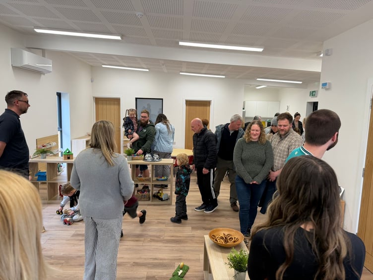 Guests take a look around the new building
