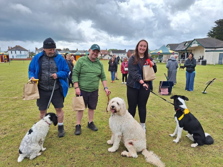 Some of the prizewinners at Watchet's dog show on Sunday, with their owners.