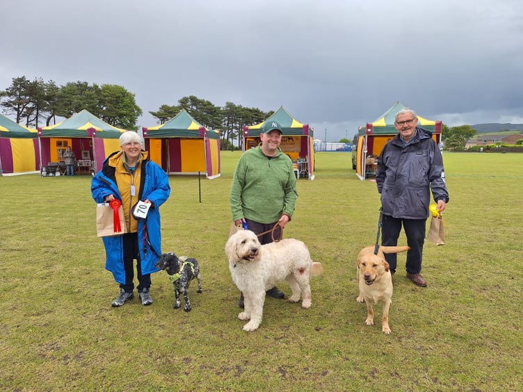 More prizewinning Watchet dogs with their owners at Sunday's first dog show on the recreation ground.