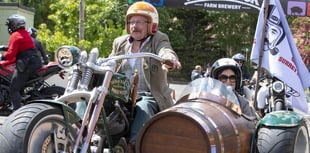 Enjoy the ride! Dapper dressers hit the road in fundraising drive