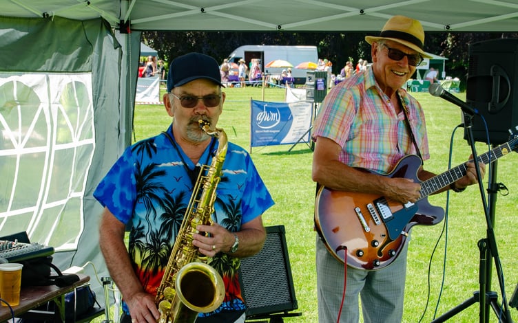 The jazz band entertaining fair-goers.