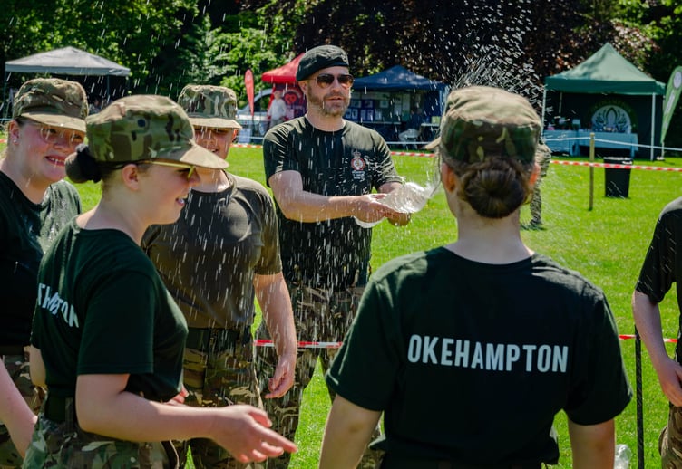 Cadets get a cool down in the boiling hot weather.