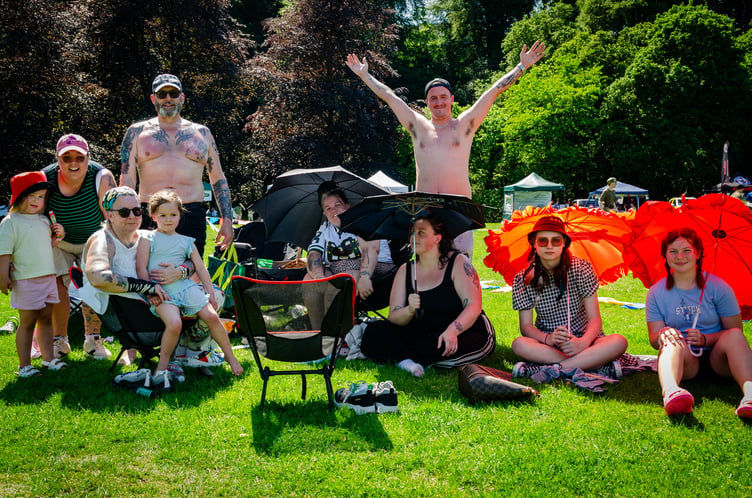 A family enjoying the sunny weather.
