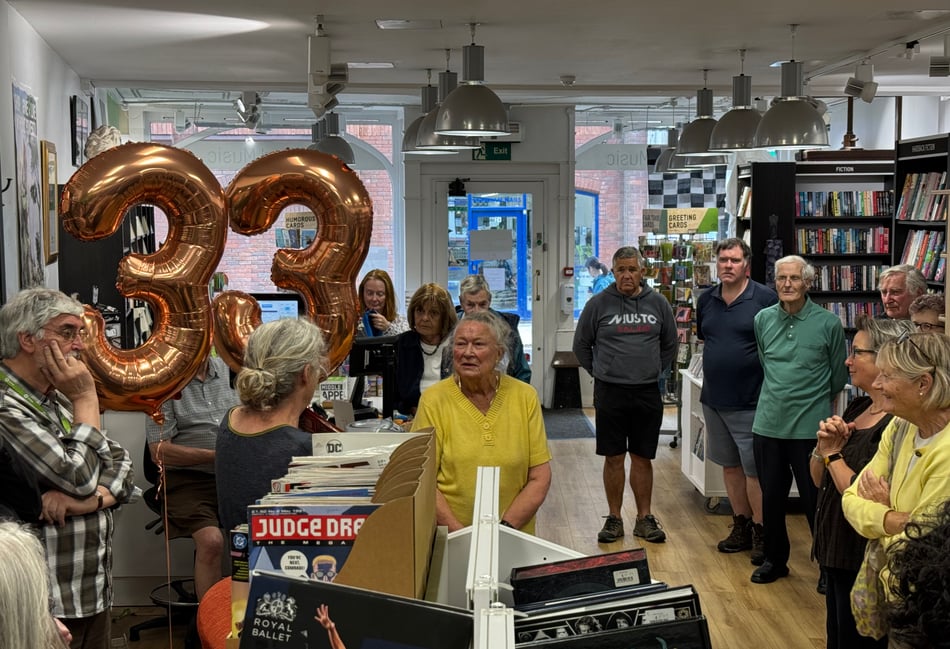 Volunteer honoured for years of service at Oxfam shop