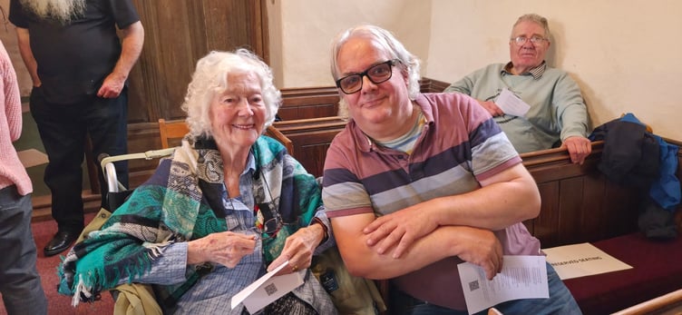 Kath Lammacraft celebrating her 92nd birthday with son Robert at Choral Evensong in St Petrock's Church, Timberscombe.
