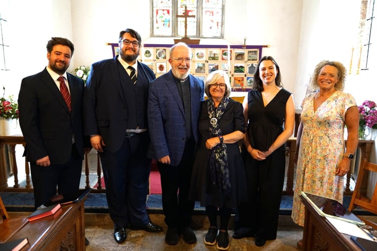 Pictured at Timberscombe St Petrock's Church Choral Evensong are Thomas Elwin, Alex Jones, Archdeacon Emeritus Elwin Cockett, Susan Cockett, Olivia Hugh-Jones, and Emma Brain-Gabbott.