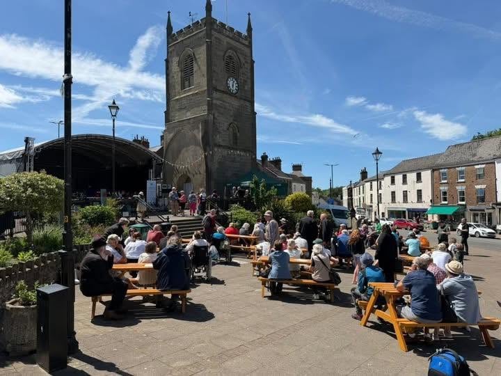 Crowds enjoy the start of the Festival at the Clocktower