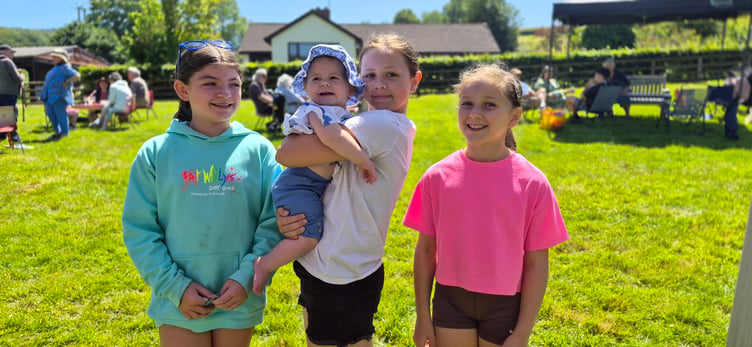 Young visitors to the St Petrock's Church family day in Timberscombe were Olivia, Cora, Aurora, and Heidi.