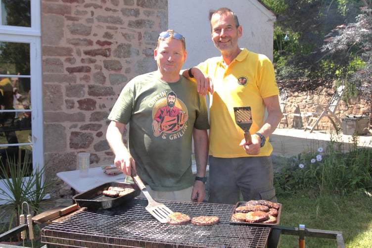No self-respecting village fete would be without a barbecue, and Guy Kennett and Simon Tremblett ensured Sampford Brett maintained its reputation. PHOTO: George Ody.