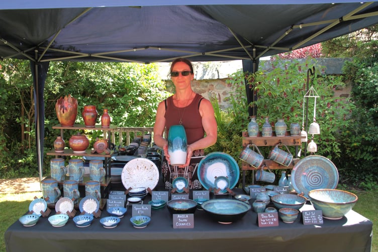 Angela Swann with her pottery for sale at Sampford Brett village fete. PHOTO: George Ody.