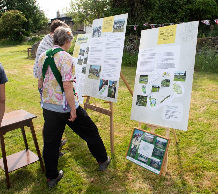 Interpretation boards explain the history of the Brompton Regis Millennium Green over the past quarter of a century. PHOTO: Dale Cherry.