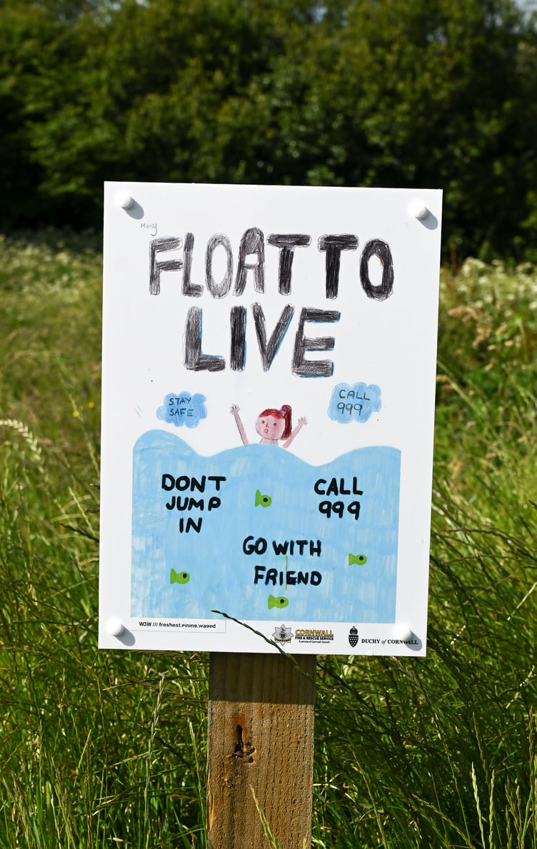 Water safety posters at the SUDS ponds, created by pupils at Nansledan Skol (Picture: The Duchy of Cornwall by Hugh Hastings)