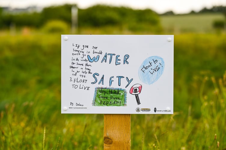 Water safety poster at the SUDS ponds, created by pupils at Nansledan Skol (Picture: The Duchy of Cornwall by Hugh Hastings)