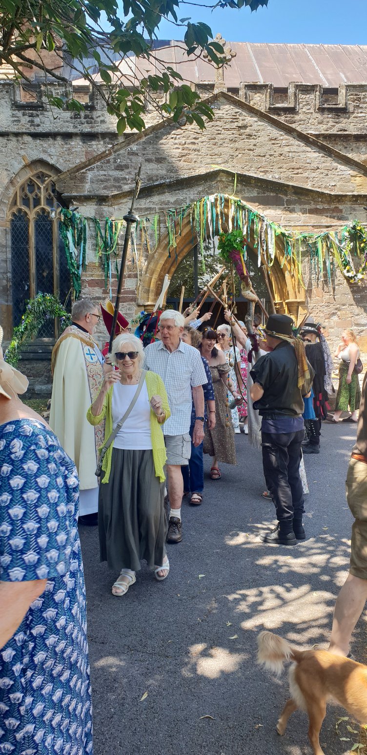 A human archway created by Morris dancers and guest visitors formed an exit for the 'clipping the tower' visitors at St John's Church, Wellington.