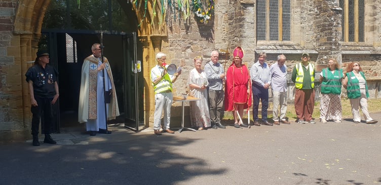Wellington Folk and Custom Society founder Lee Edmead (left) with St John's Church Rector the Rev Colin Simpson, and Wellington Mayor Cllr Mark Lithgow between' St Brigit' and 'Bishops Blaize'.