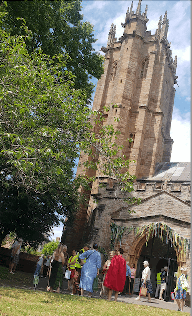 The tower of St John's Church, Wellington, towers over guests at the patronal festival.