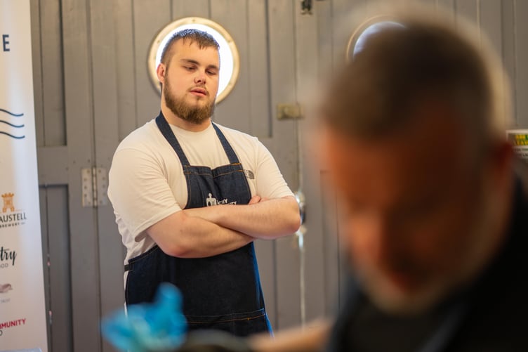 A participating student in the kitchens for the CRCC 80th anniversary banquet (Picture: Perran Tremewan/CRCC)