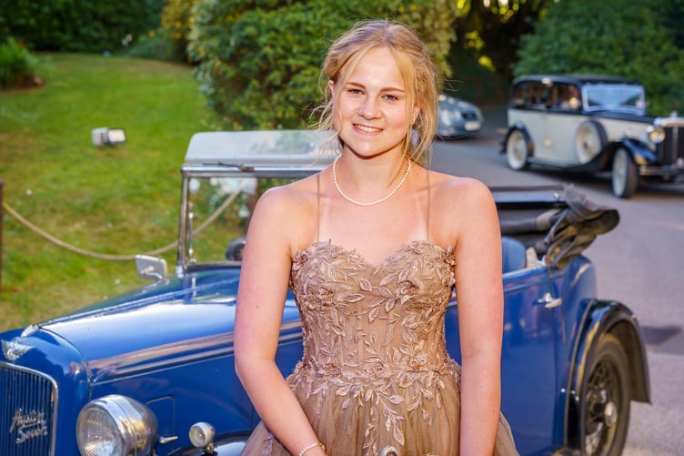 A classic car and a classic gown at the Roseland Academy Prom 2026