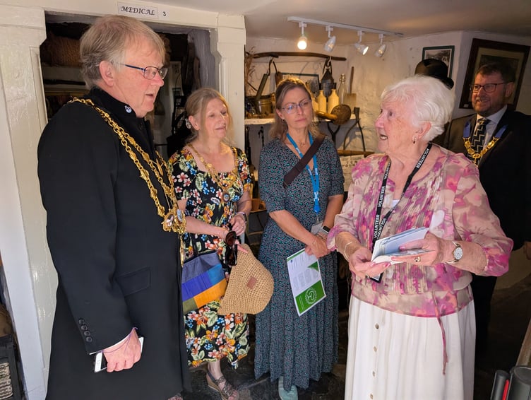 Invited dignitaries were given a tour of Holsworthy's remarkable museum, with one of its dedicated volunteers parting her extensive knowledge of the exhibits (Picture: Aaron Greenaway)