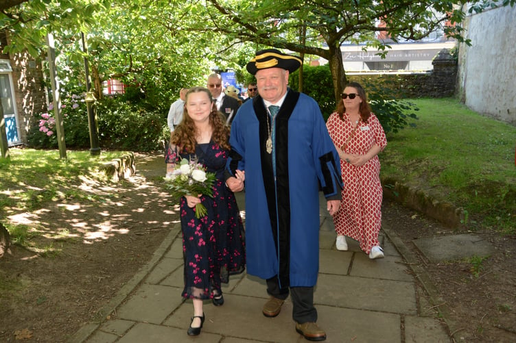 Eliza Jeffery, the new Pretty Maid being accompanied by the Portreeve shortly after her unveiling (Picture: Rodney Parrish)