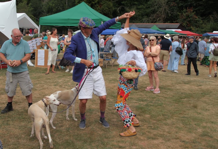 Robin and Paola Wight have fun in the sun at Roadwater Fete. PHOTO: George Ody.
