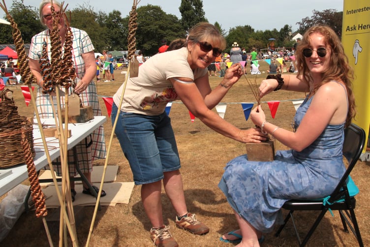 Basket weaving at Porlock Country Fair with Nicky Purcell and Iona Chard. PHOTO: George Ody.
