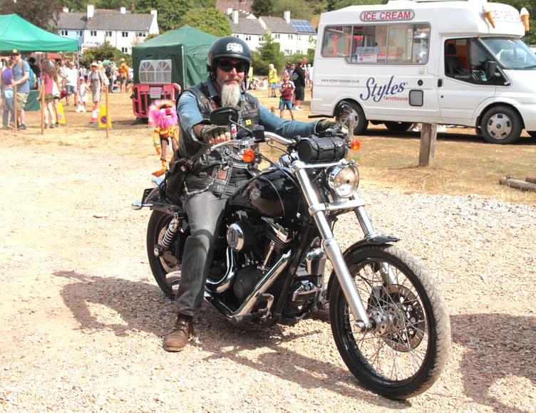 A Porlock Country Fair visitor shows off his Harley Davidson motorbike. PHOTO: George Ody.