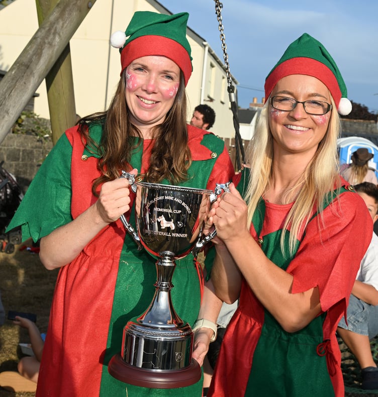 Lauren Williams and Cindy Johnson proud to take the Pearl Cory and Bonzo Memorial Cup for best overall winner with Christmas Lights (Picture; Adrian Jasper)